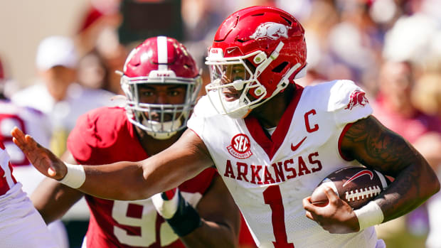 Razorbacks quarterback KJ Jefferson scrambling for yardage against Alabama
